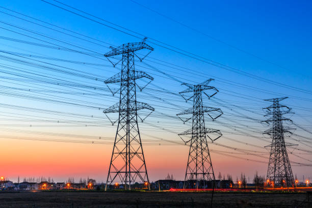 high voltage post,High voltage tower sky sunset background