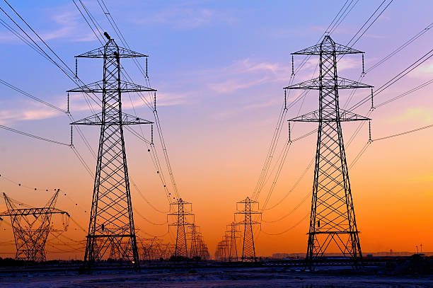 very beautiful and clear image of electrical pylon in a magnificient sunset in outskirt dubai, image also depicting communication and connection in a organization.  Related images: http://www.istockphoto.com/file_search.php?action=file&lightboxID=4429328